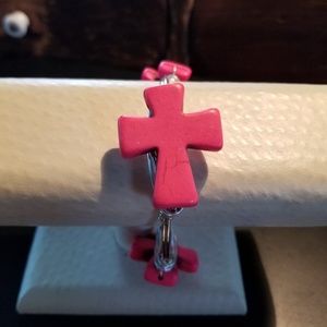 Pink & silvertone cross hand wrapped bracelet